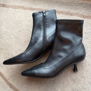Woman’s black booties